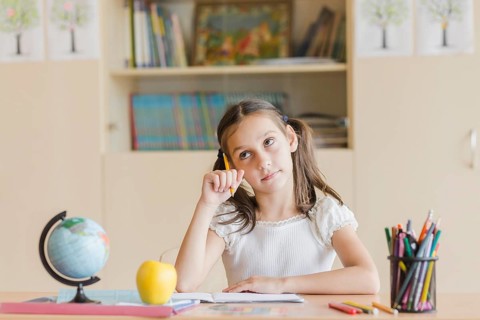 Girl thinking during lesson
