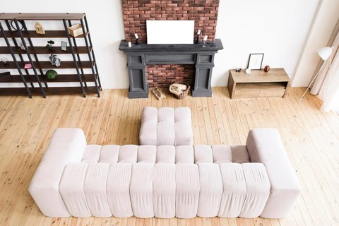 High angle minimalist living room with fireplace