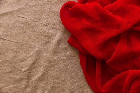 Smooth red textile brown fabric background
