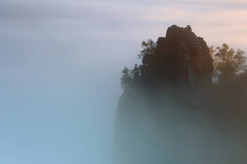Autumn fog at sunrise