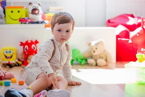 Boy sitting playroom