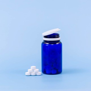 High angle pills plastic container with copy space