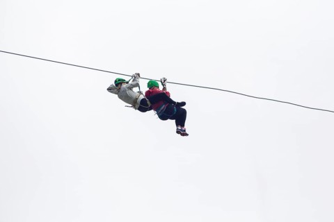 Two hiker zip line adventure against sky costa rica