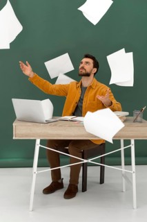 Stressed man working laptop