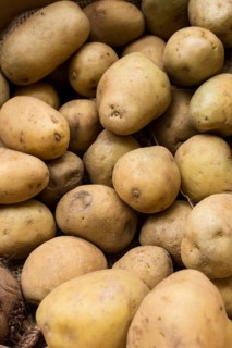 Top view raw potatoes arrangement
