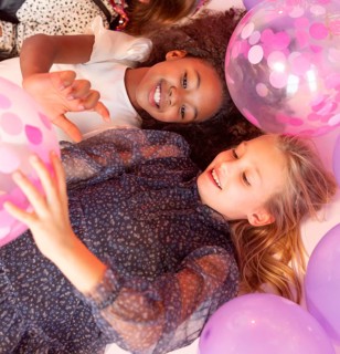 Portrait young girls party with balloons