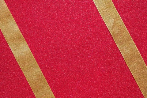 Two parallel ribbons red background