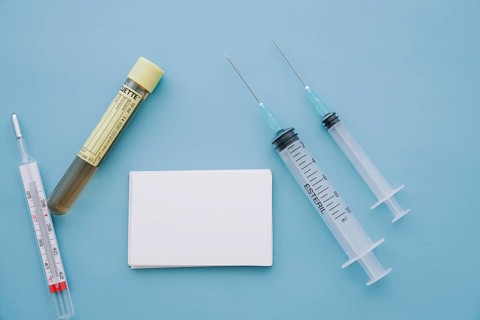 Syringes thermometer sample with business card