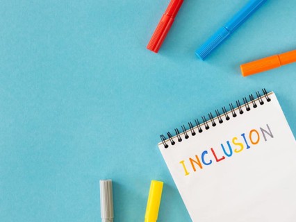 Inclusion word written notebook