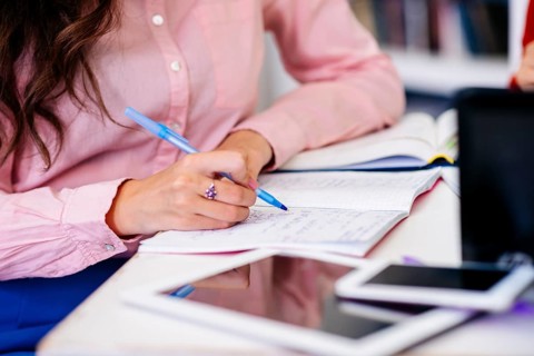 Hand writing notebook table