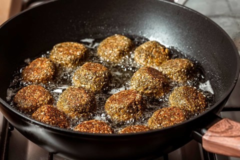 Delicious falafel frying pan high angle