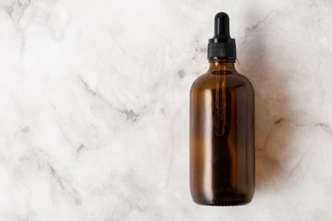 Top view bottle oils with copy space