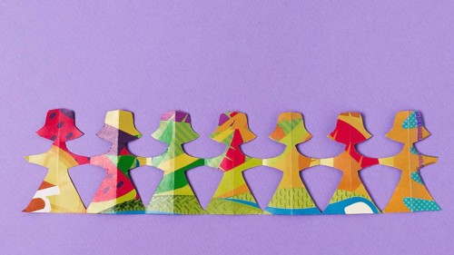 Female made from colourful paper top view