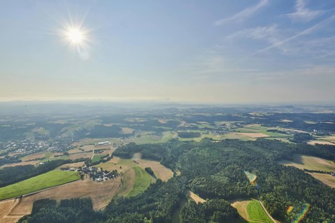 Aerial view over the fields and forests near Woerth an der Donau