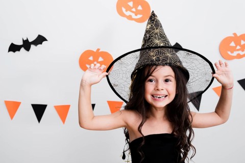 Front view little girl witch costume halloween