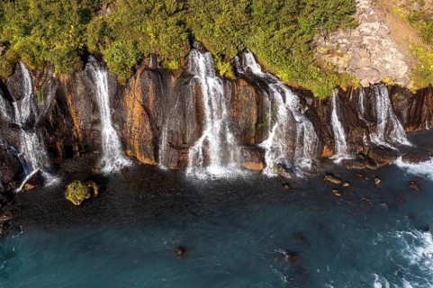 Hraunfossar waterfalls with river Hvita in summer