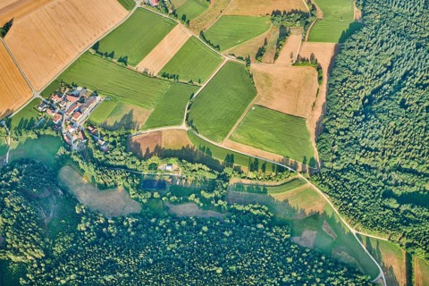 Aerial view over the fields and forests near Woerth an der Donau