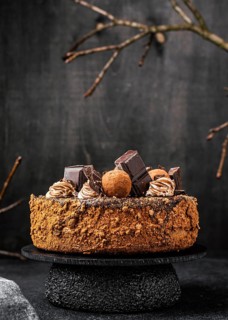 Front view round chocolate cake stand