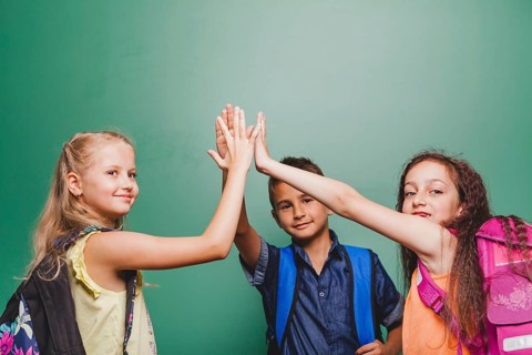 Children giving high five