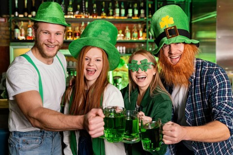 Front view smiley people celebrating st patrick s day