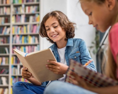 Kids reading doing their homework