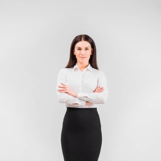 Business woman standing with crossed arms