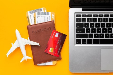 Top view passport laptop arrangement