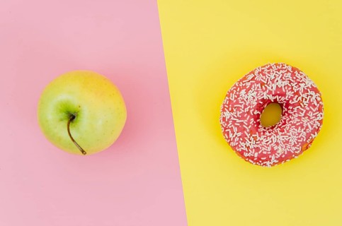 Top view donut vs fruit