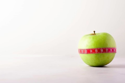 Close up delicious organic apple with copy space