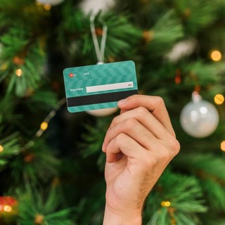 Man holding plastic credit card hand