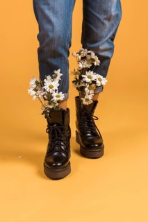 Woman legs with flowers shoes