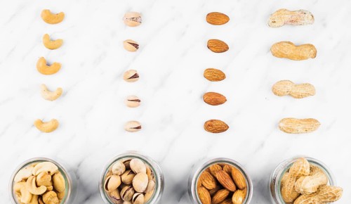 Fresh nut food jar marble surface
