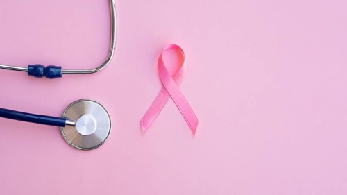 Top view pink ribbon with stethoscope