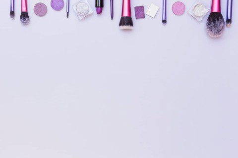 Top border arranged with cosmetics product white background