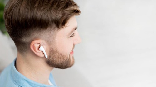 Copy space man with airpods