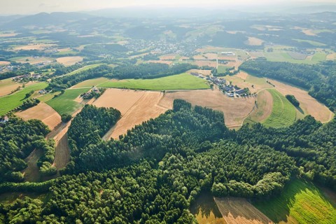 Aerial view over the fields and forests near Woerth an der Donau