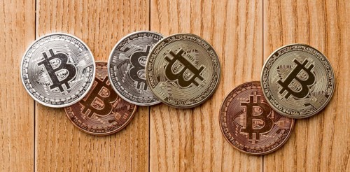 Bunch bitcoins wooden table