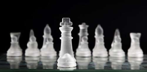 Transparent chess pieces board