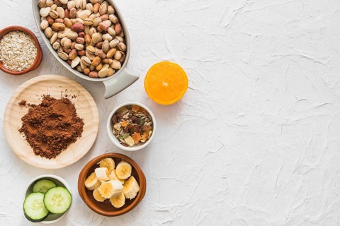 Elevated view various healthy ingredients white surface