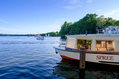Large Mueggelsee with boats at Mueggelpark near the Spree Tunnel