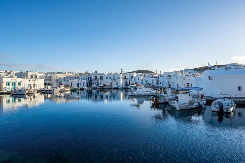 Harbour with fishing boats and reflection