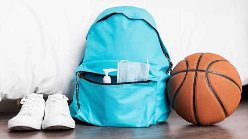 Back school arrangement with blue backpack