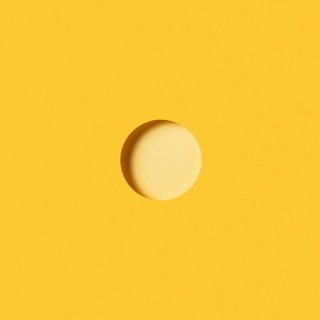 Modern background with light yellow circular piece paper