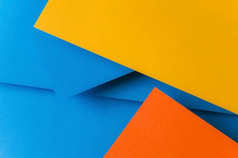 Blue orange yellow color papers background