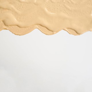 Flat lay abstract foundation stain with copy space