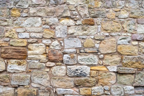 Wall stones made of different types of stone
