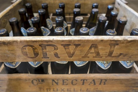 Orval Trappist beer bottles in vintage wooden crate at Orval Abbey
