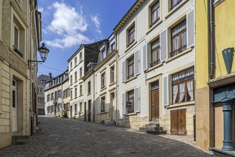 Old houses along cobbled street in the city Bouillon