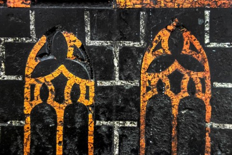 Detail of medieval epitaph on gravestone