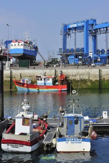 Trawler fishing boats on shipbuilding yard for maintenance works in the Guilvinec port